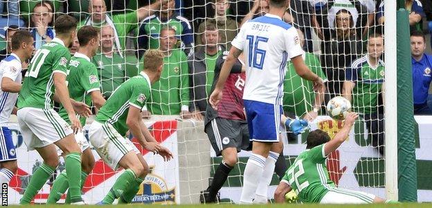 Will Grigg's stoppage-time goal could not save Northern Ireland from defeat in Belfast