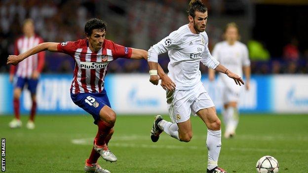 Real Madrid's Gareth Bale (right) and Atletico Madrid's Stefan Savic