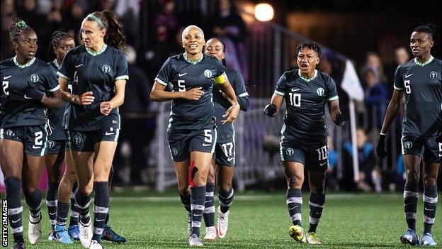 Nigeria player in action against Canada