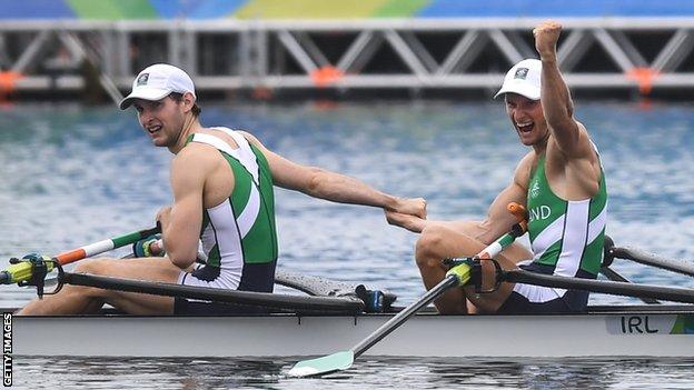 Gary O'Donovan (right) celebrates and he and his younger brother Paul clinch a lightweight double sculls silver medal in Rio