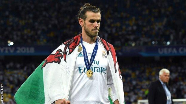 Real Madrid forward Gareth Bale celebrates winning the Champions League