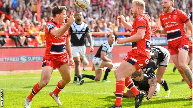 Lachlan Coote celebrates a try