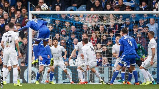 Cardiff defender Sol Bamba heads his side ahead against QPR