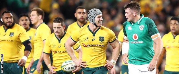 David Pocock of the Wallabies and Ireland captain Peter O'Mahony exchange words during the third Test in Sydney