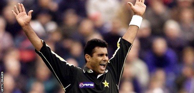 Waqar Younis celebrates taking a wicket