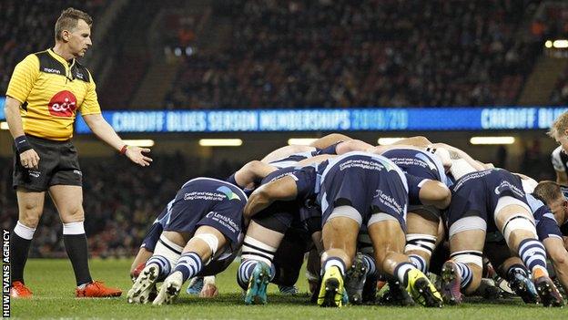 Nigel Owens takes charge at a scrum