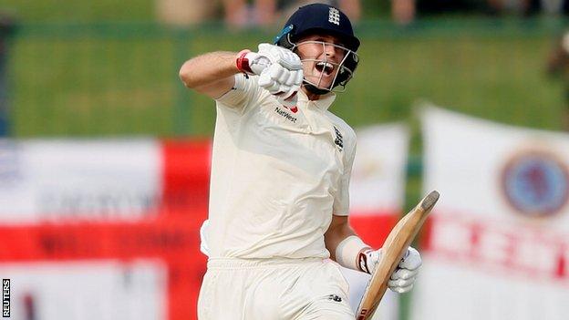 England captain Joe Root punches the air in celebrations after reaching his century against Sri Lanka