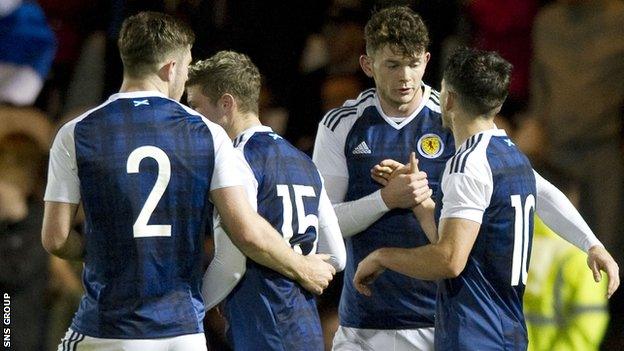 Oliver Burke captained Scotland on what was his debut at Under-21 level