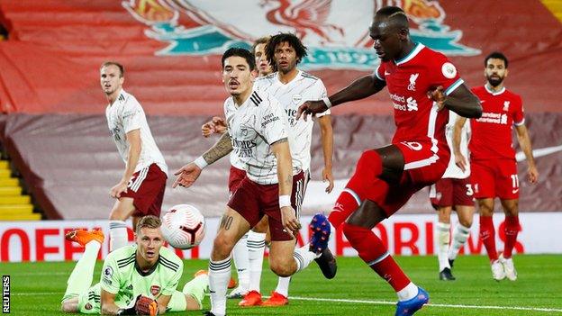 Sadio Mane scores in Liverpool's 3-1 league win over Arsenal at Anfield