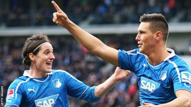 Niklas Sule (right) celebrates a Hoffenheim goal with Sebastian Rudy