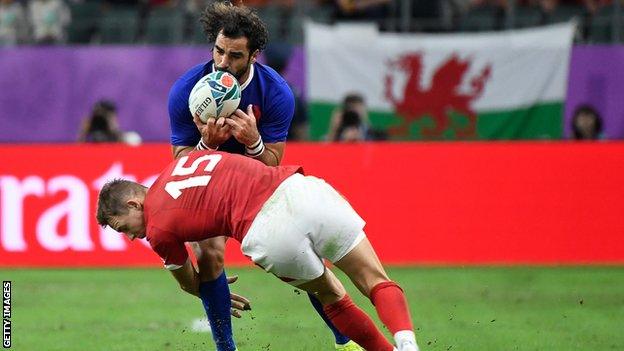 France wing Yoann Huget is tackled by Wales full-back Liam Williams during the 2019 World Cup quarter-final