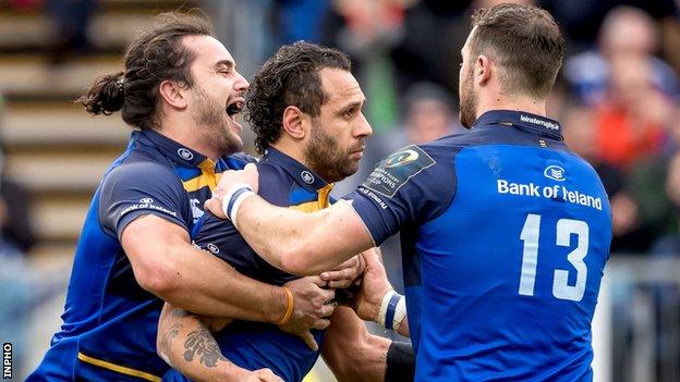 James Lowe and Robbie Henshaw congratulate Leinster try-scorer Isa Nacewa