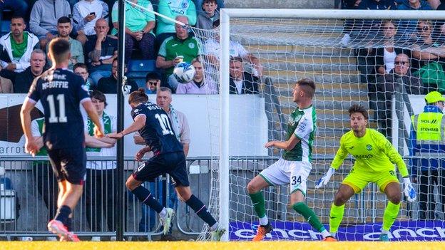 Aidan Nesbitt's first-half header earned Falkirk victory over top-flight Hibernian