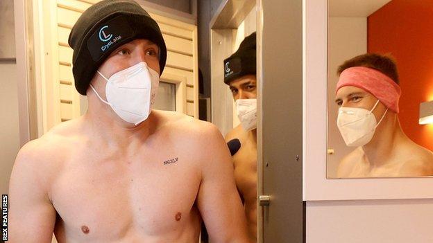 Josh Adams leaves the Lions' cryotherapy chamber in Jersey