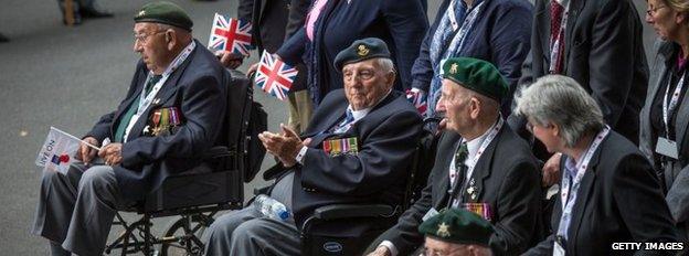 Veterans taking part in a parade down Whitehall