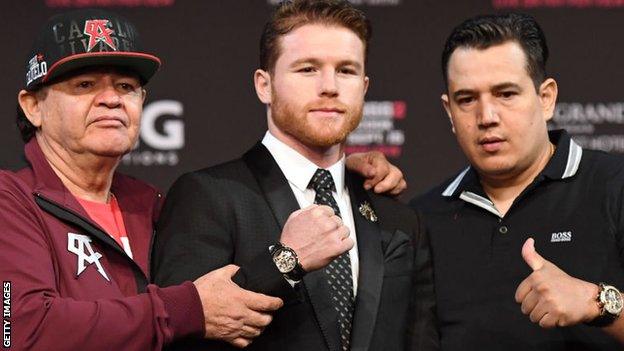 Father and son 'Chepo' (left) and Eddie Reynoso oversee Alvarez's training