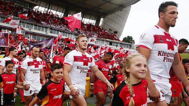 Sam Burgess leads out England team-mates in the Tonga World Cup semi-final last week