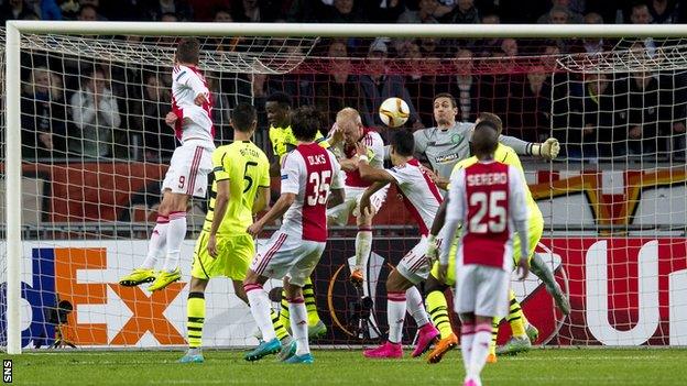 A free-kick by Lasse Schone evades everyone in the box and finds the net to give Ajax an equaliser against Celtic