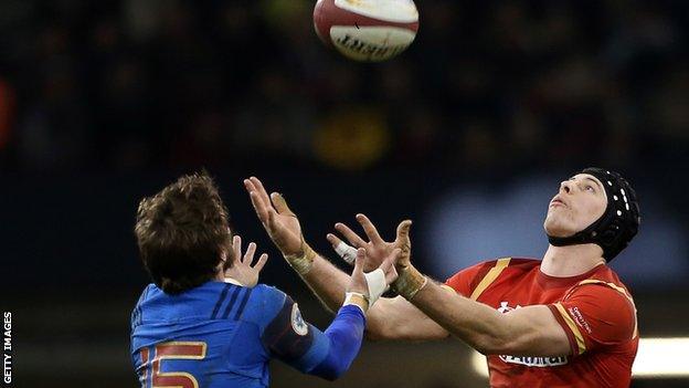 Liam Williams and Maxime Medard challenge for a high ball