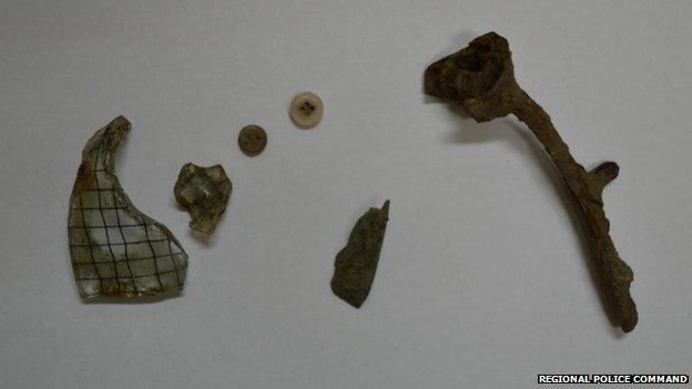 Items supposedly taken at the former Auschwitz death camp by two British schoolboys