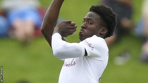 Chemar Holder bowls for the West Indies.