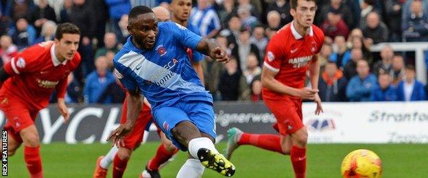 Hartlepool's Kudus Oyenuga scores from he penalty spot in the game against Leyton Orient