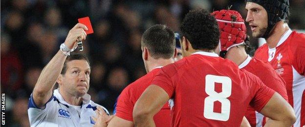 Alain Roland issues a red card to Sam Warburton during the 2011 World Cup semi final in Auckland