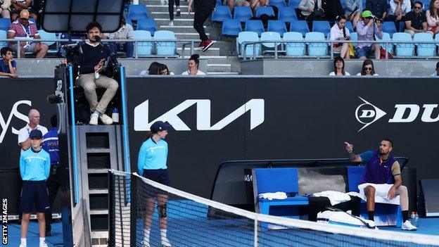 Nick Kyrgios argues with the chair umpire