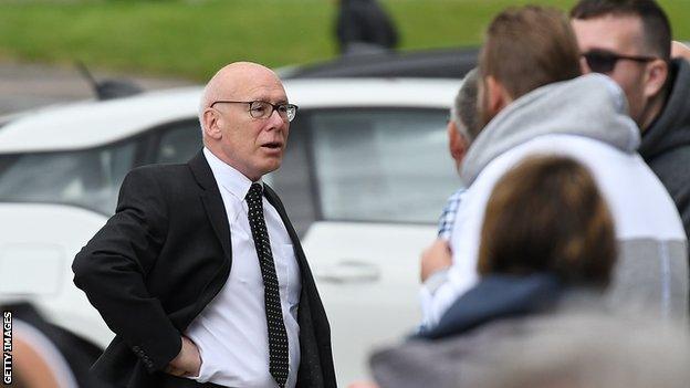 Derby owner Mel Morris speaks to fans