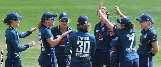 England celebrate a wicket at Headingley