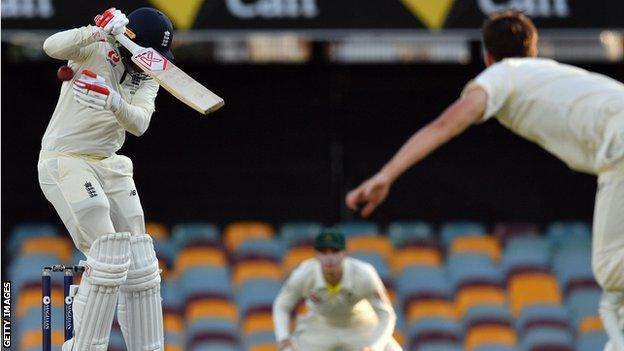 Mark Stoneman tries to get out of the way of a bouncer at the Gabba