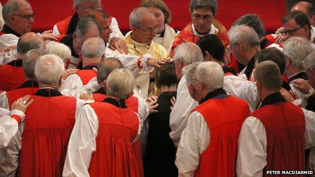 Bishops laying hands