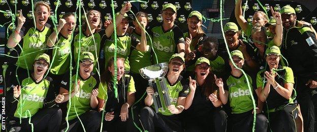 Sydney Thunder celebrate with the WBBL trophy