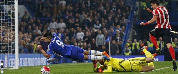 Chelsea striker Radamel Falcao goes to ground as he is challenged by Southampton keeper Martin Stekelenburg