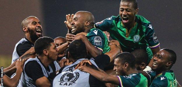 Comoros celebrate their win against Ghana