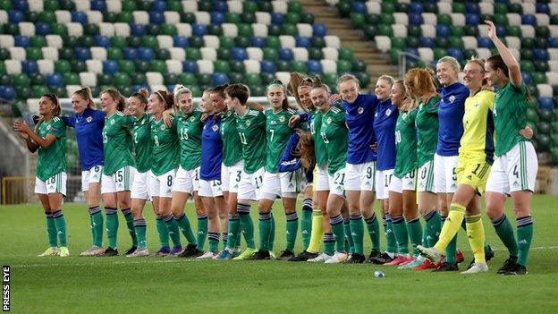 Northern Ireland's players joined the 4,079 fans in attendance for a rendition of Sweet Caroline