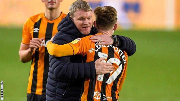 Hull celebrate their win over AFC Wimbledon