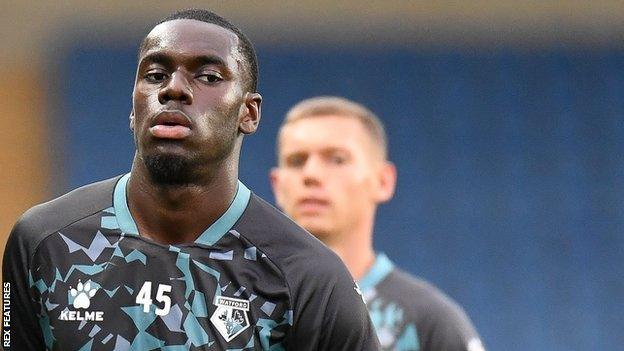 Derek Agyakwa warming up with Watford