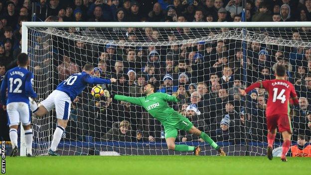 Wayne Rooney scores from the spot against Swansea