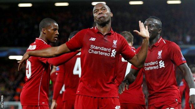 Liverpool striker Daniel Sturridge celebrates after scoring against PSG