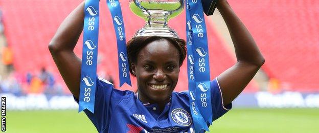 Eniola Aluko lifts the FA Cup