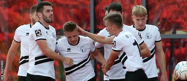 Gateshead players celebrate a goal