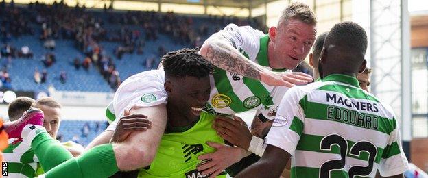 Celtic scorer Jonny Hayes is held aloft