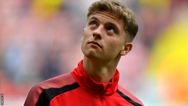 Jared Bird warms up ahead of Barnsley's game with Sheffield United in August 2017