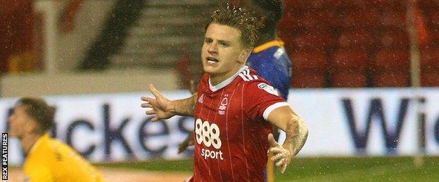 Nottingham Forest's Jason Cummings celebrates scoring against Shrewsbury Town