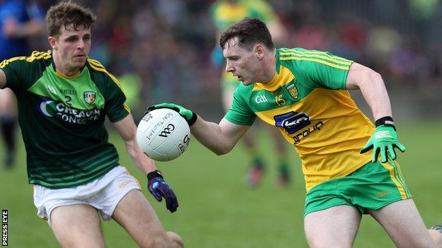 Antrim's Conor Hamill prepares to challenge Donegal goalscorer Jamie Brennan