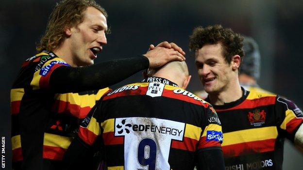 Willi Heinz of Gloucester with Billy Twelvetrees (L) and Billy Burns