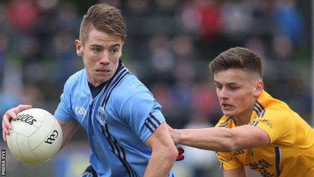 Killyclogher's Mark Bradley attempts to spin away from Coalisland's Michael McKernan