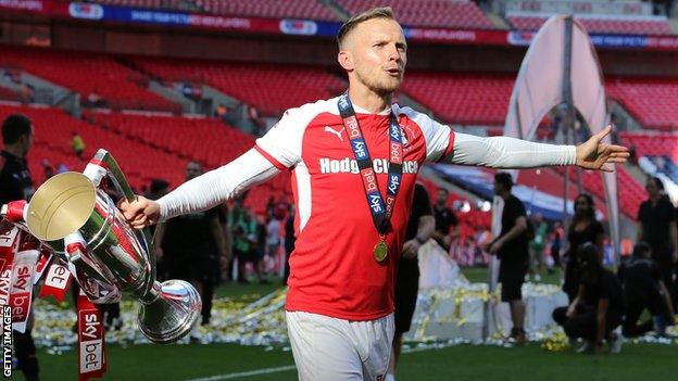 David Ball celebrates Rotherham's promotion to the Championship