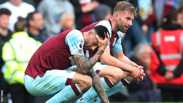 Burnley's Dwight McNeil looks dejected after relegation